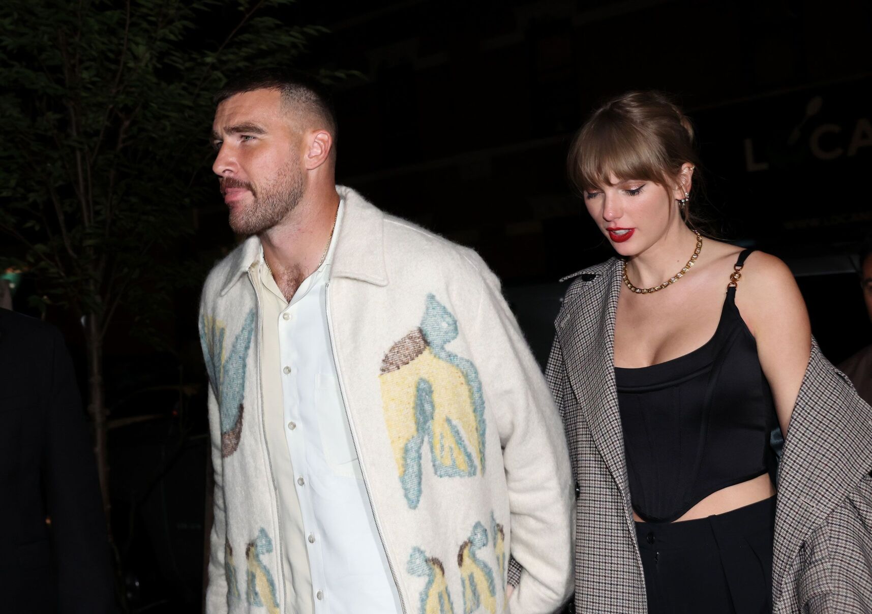 Taylor Swift and Travis Kelce’s whirlwind week caps off with ‘SNL’ cameos – and some hand-holding